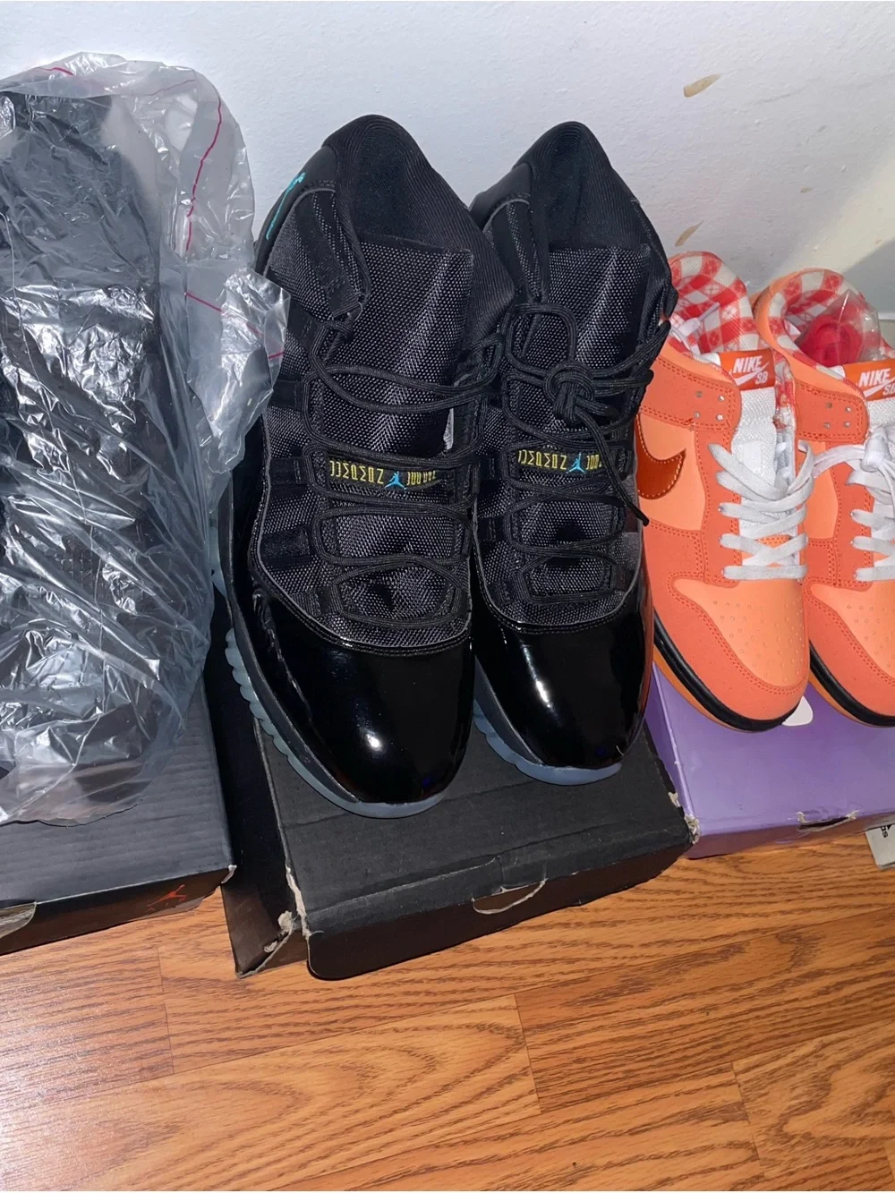 Jordan Air Jordan 11 Retro Black Patent Leather with Icy Blue Sole